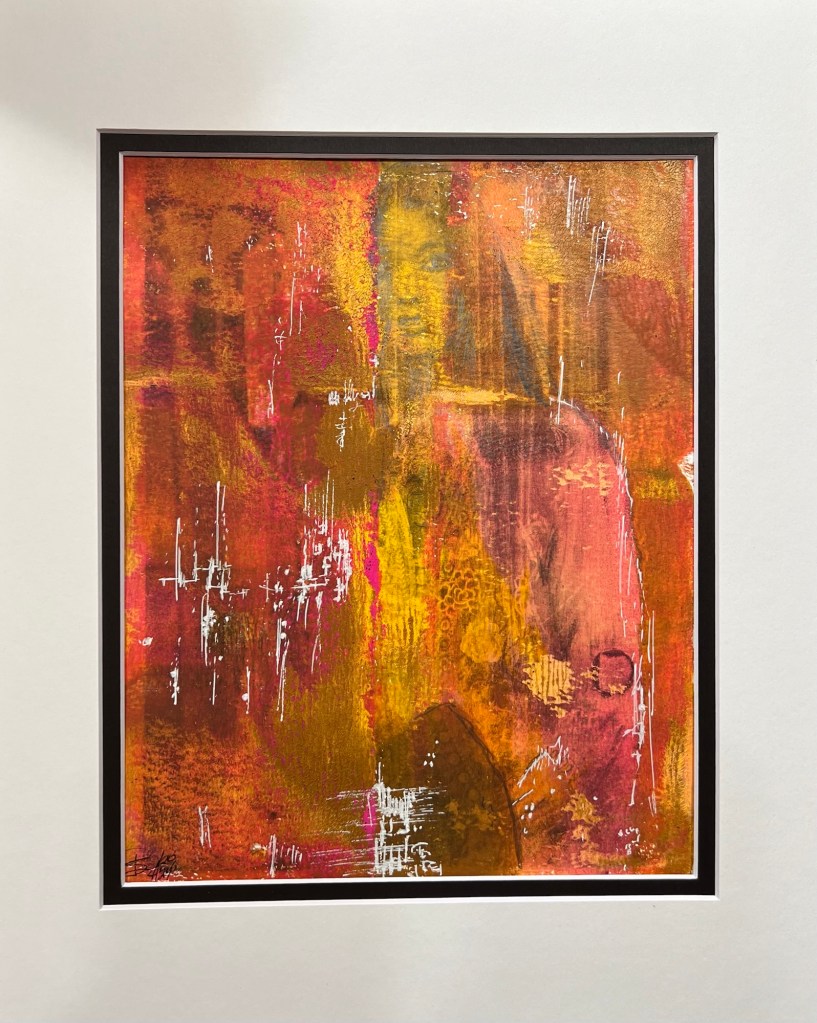 Monoprint in orange, yellow and pink with an abstract ghost of a long haired dark woman hidden behind the wash of colors. 
